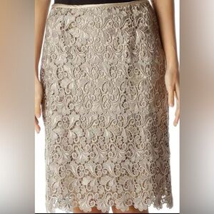 Tahari gold satin-lined and lace skirt; size 4